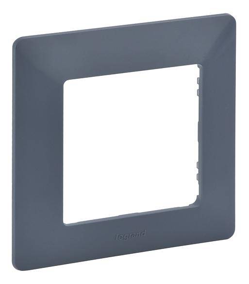 Un cadre rectangulaire gris foncé, probablement pour un interrupteur ou une prise électrique, à surface lisse.