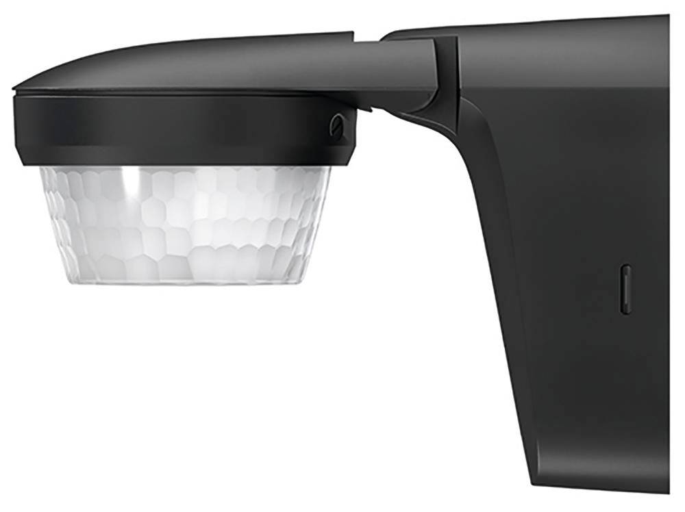 Vue latérale d'un capteur noir avec un couvercle bombé et transparent. Il semble conçu pour détecter des mouvements ou de la lumière.