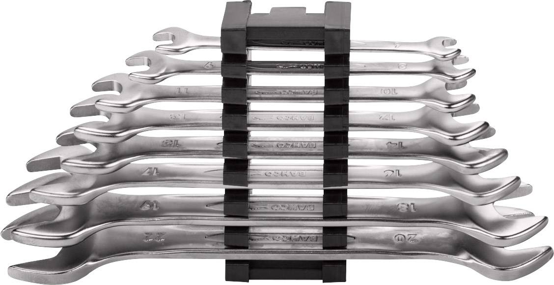 Ensemble de clés mixtes en argent empilées maintenues ensemble par des attaches en plastique noir, disposées par taille sur un fond blanc.