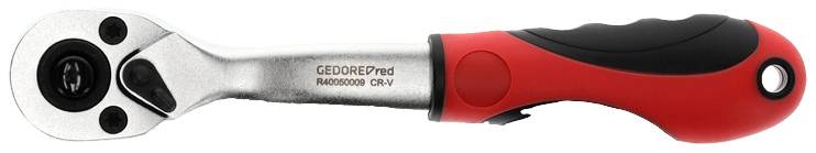 Une clé à molette avec une poignée rouge et noire est posée horizontalement. La poignée présente une surface texturée pour une meilleure prise en main.