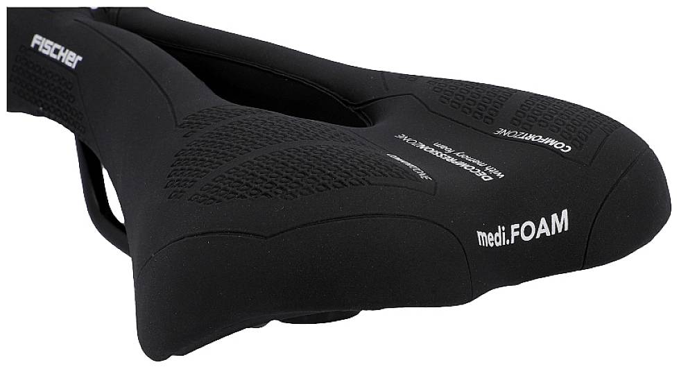 Un selle de vélo noir avec l'inscription 'medi.FOAM' sur le côté. Design ergonomique pour un confort optimal lors du cyclisme.