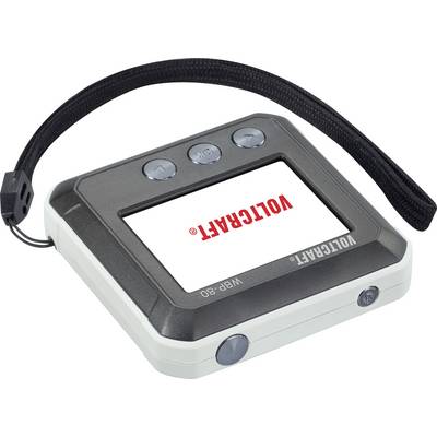Un appareil électronique doté d'un écran, de trois boutons et d'un bracelet de fixation. La marque 'VOLTCARF' est visible sur l'écran.