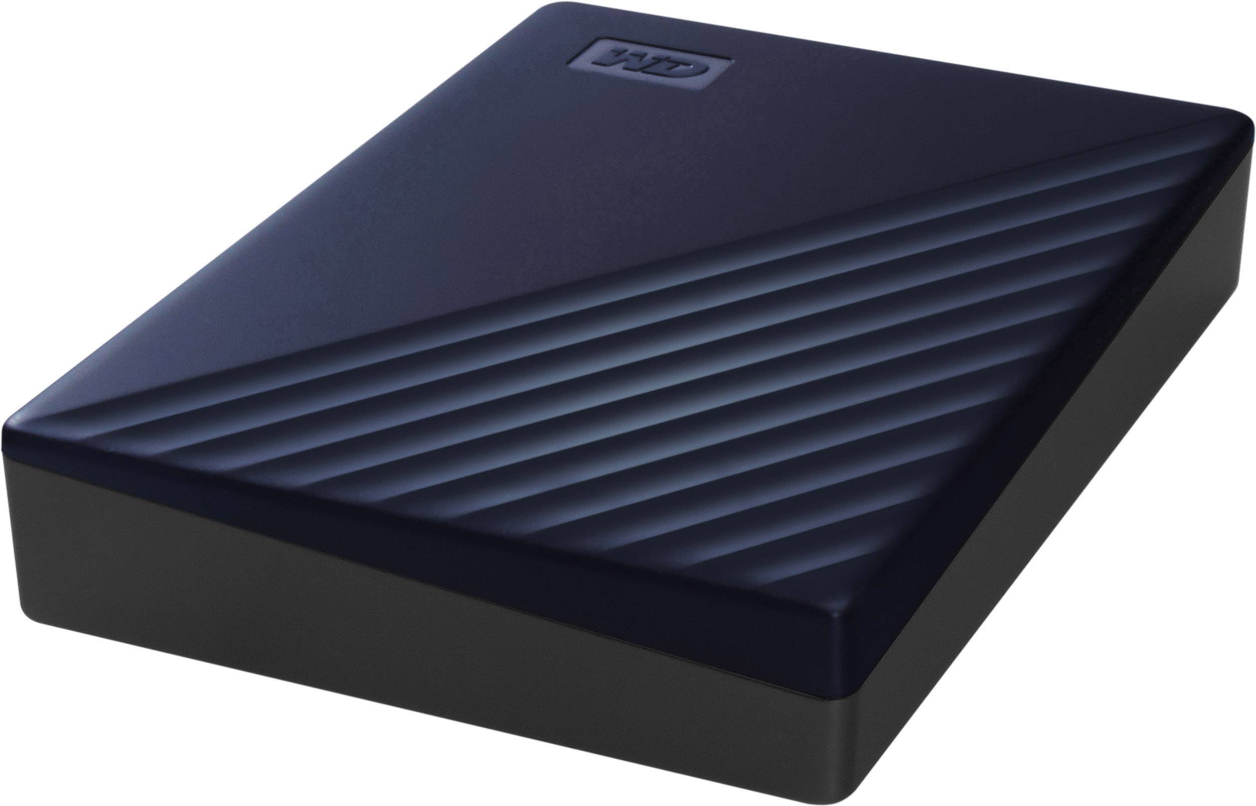 Un disque dur externe noir avec un design nervuré sur le dessus.