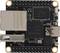 Une petite carte électronique avec un port USB et plusieurs puces, dont une grande, étiquetée 'Rockchip'.