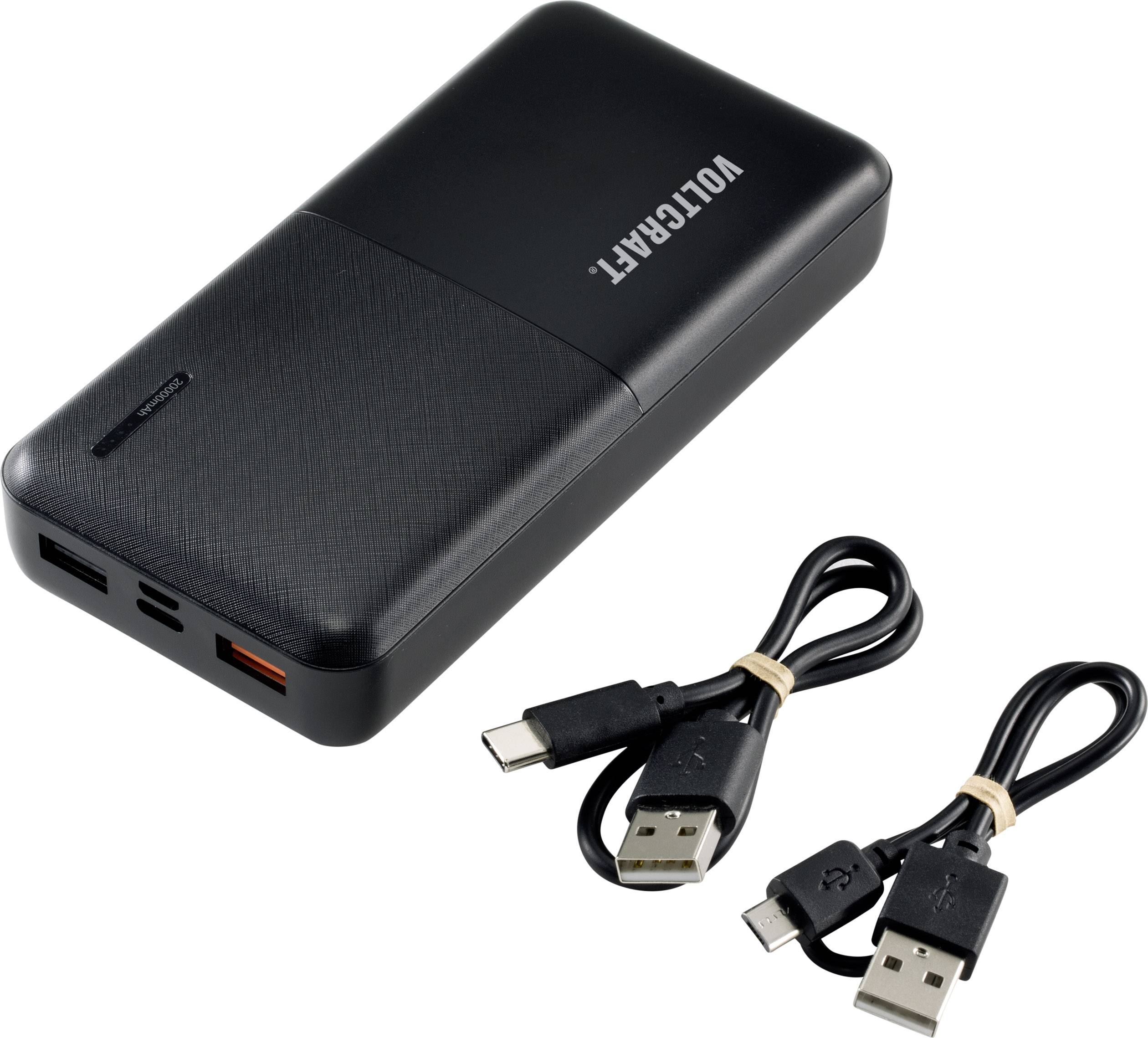 Batterie externe noire avec logo 'VOLTCRAFT', deux câbles USB, l'un avec connecteur USB-C et l'autre avec connecteur Micro-USB.