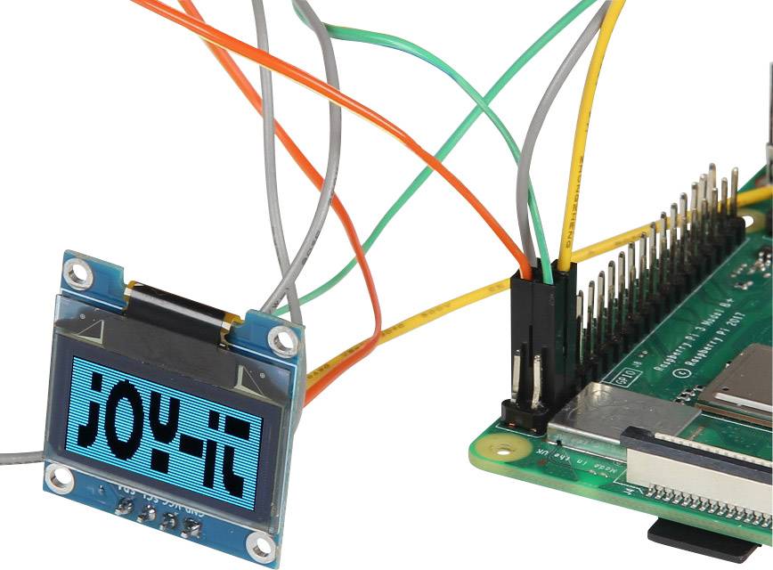 'Petit écran OLED avec inscription "JOY-IT" relié à une carte microcontrôleur verte à l'aide de plusieurs câbles colorés.'
