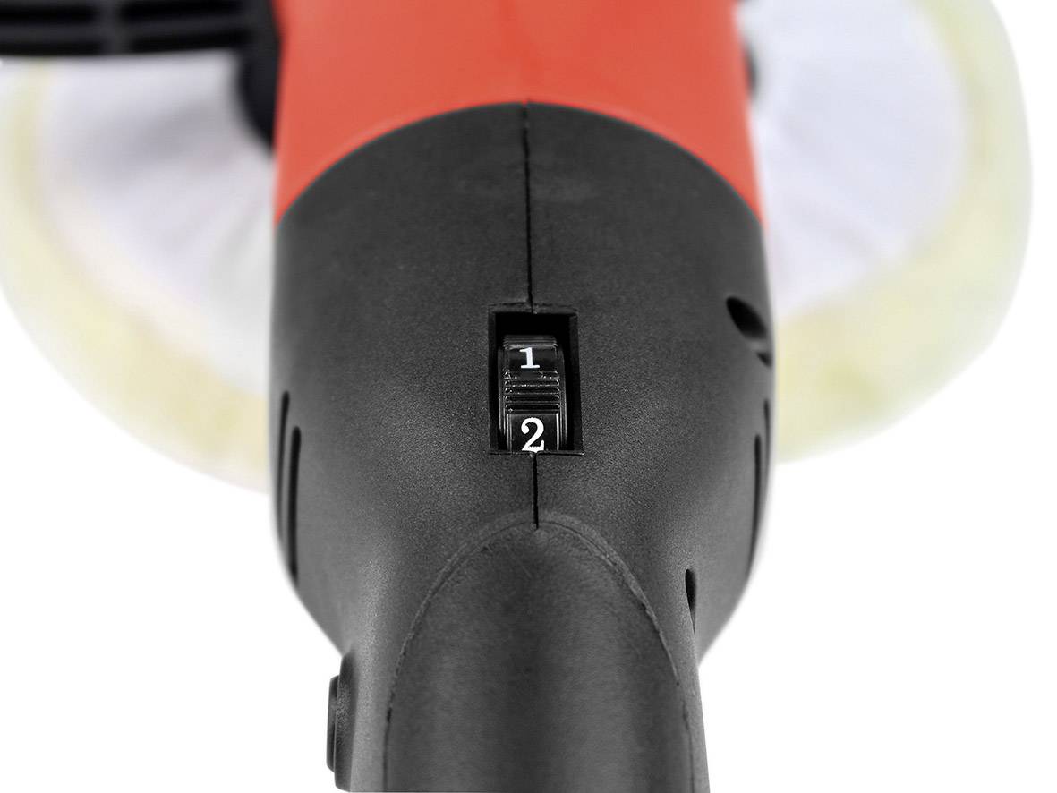 'Gros plan d'une polisseuse rouge et noire avec régulateur de vitesse réglé sur le niveau 2.'