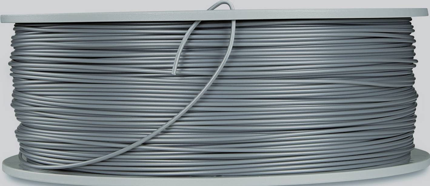 Une grande bobine de fil gris, enroulée sur un disque rond.