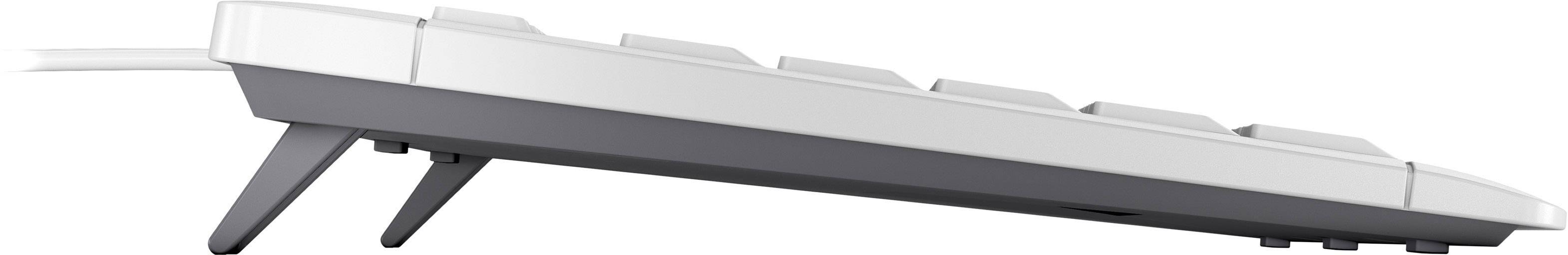 Un clavier blanc, vu de côté, légèrement surélevé.