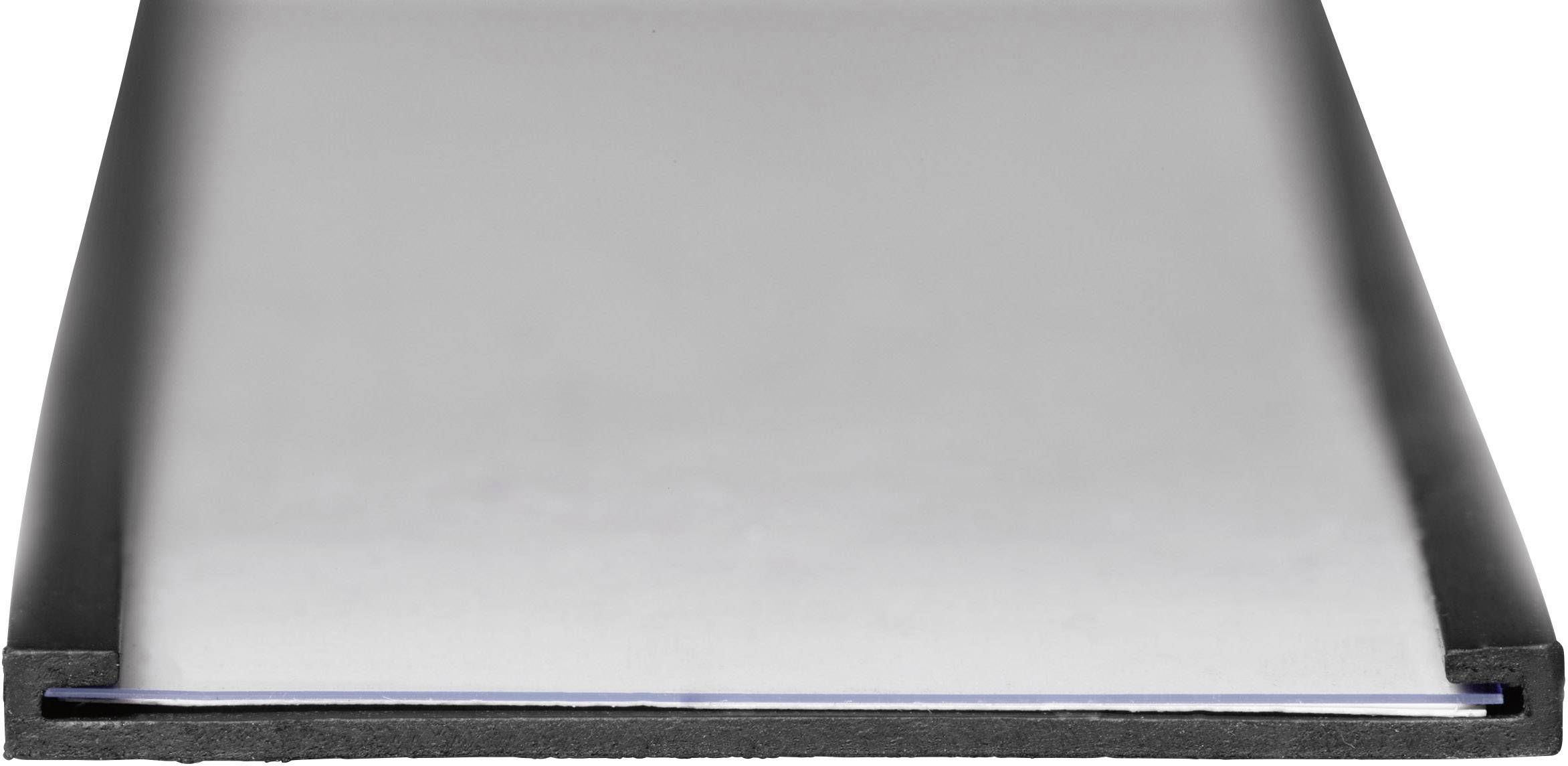 Un gros plan d'un plateau noir avec un fond blanc, posé horizontalement sur une surface.