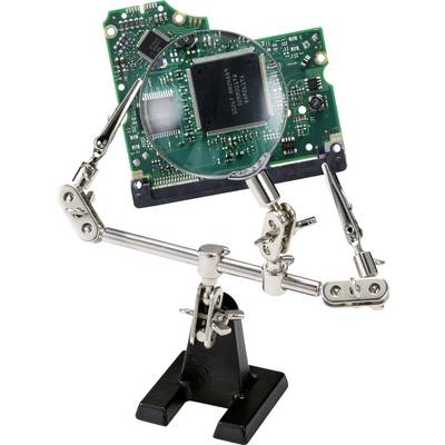 Support réglable avec loupe maintenant une carte électronique verte.