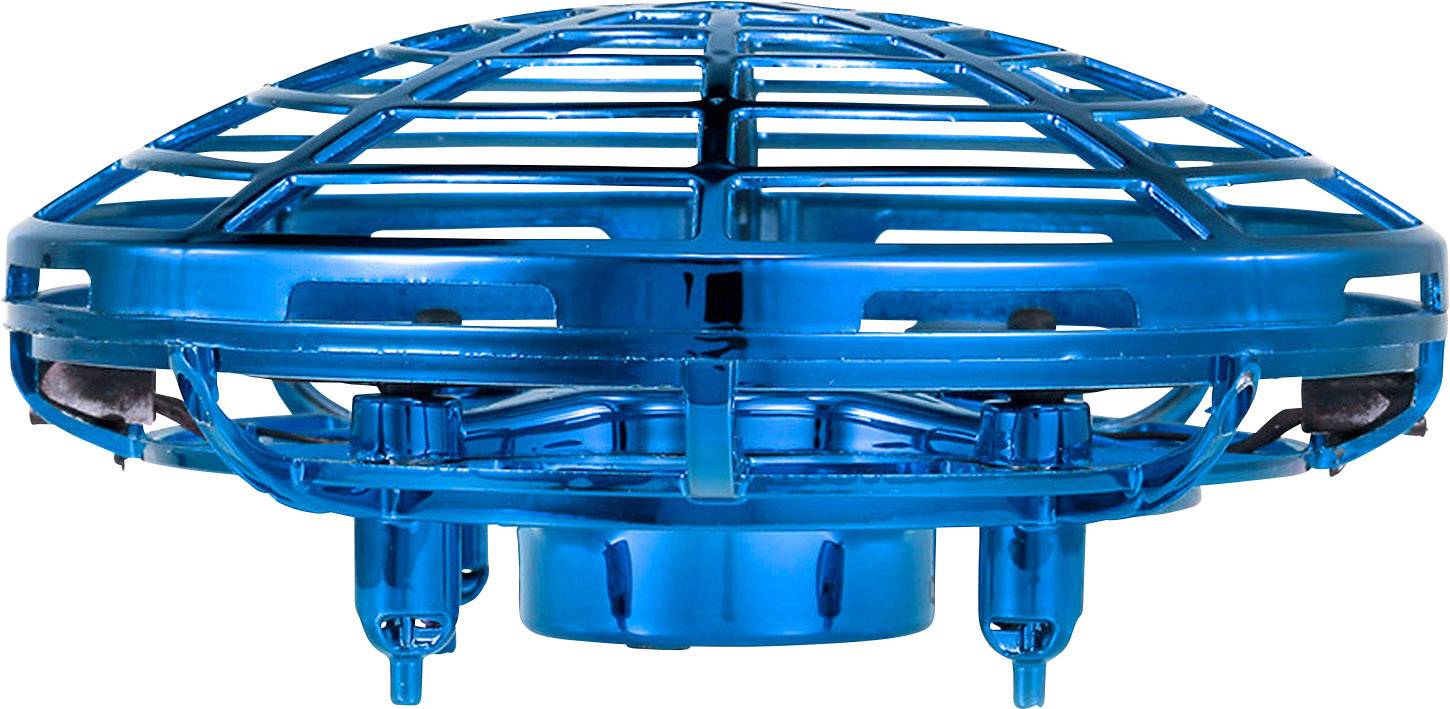 Un mini-drone de jouet bleu, en forme de disque, avec une grille de protection, qui flotte sur un fond blanc.