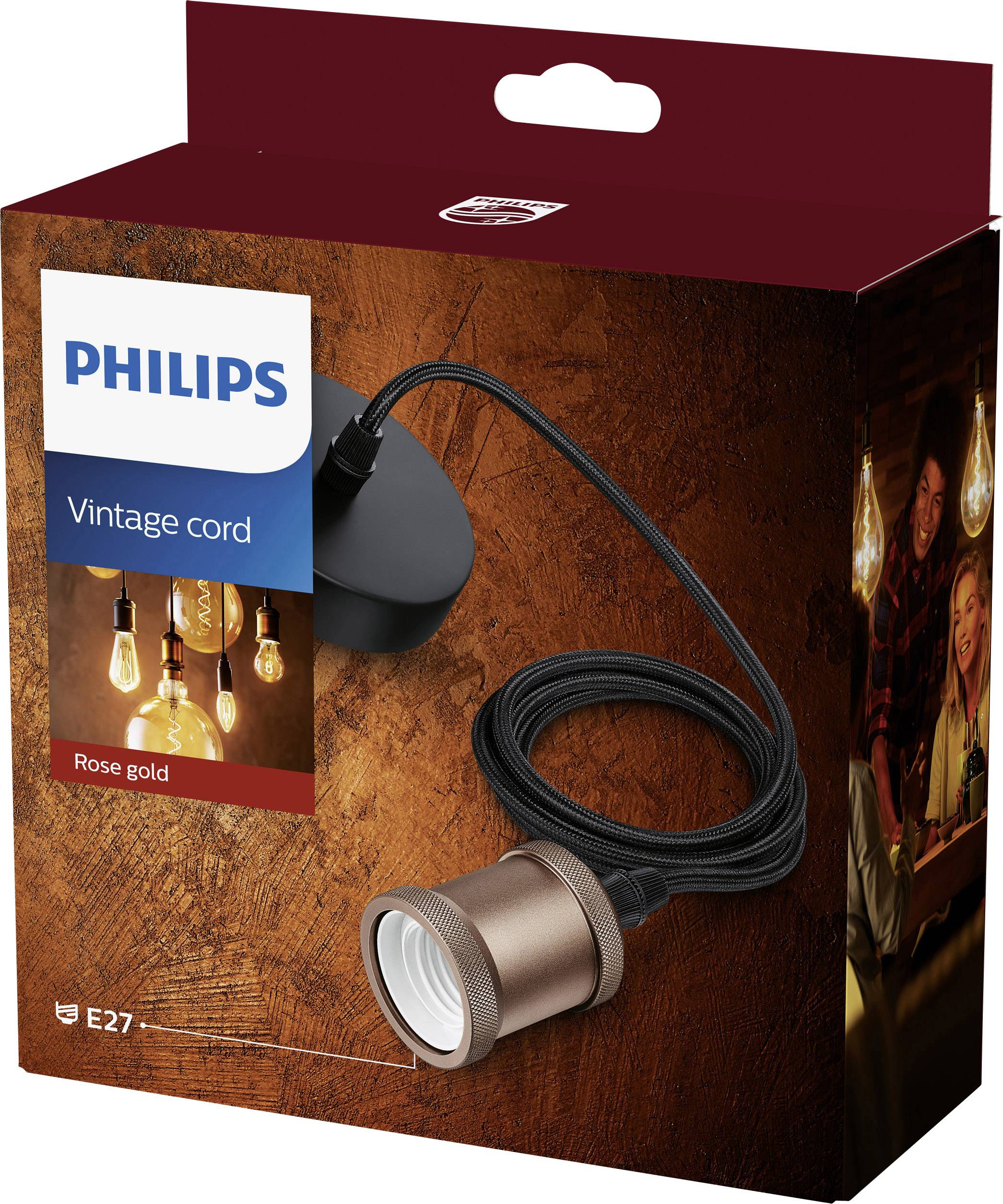 Un emballage présentant une douille vintage et un câble en or rose. La marque est Philips. Conçu pour un éclairage décoratif.