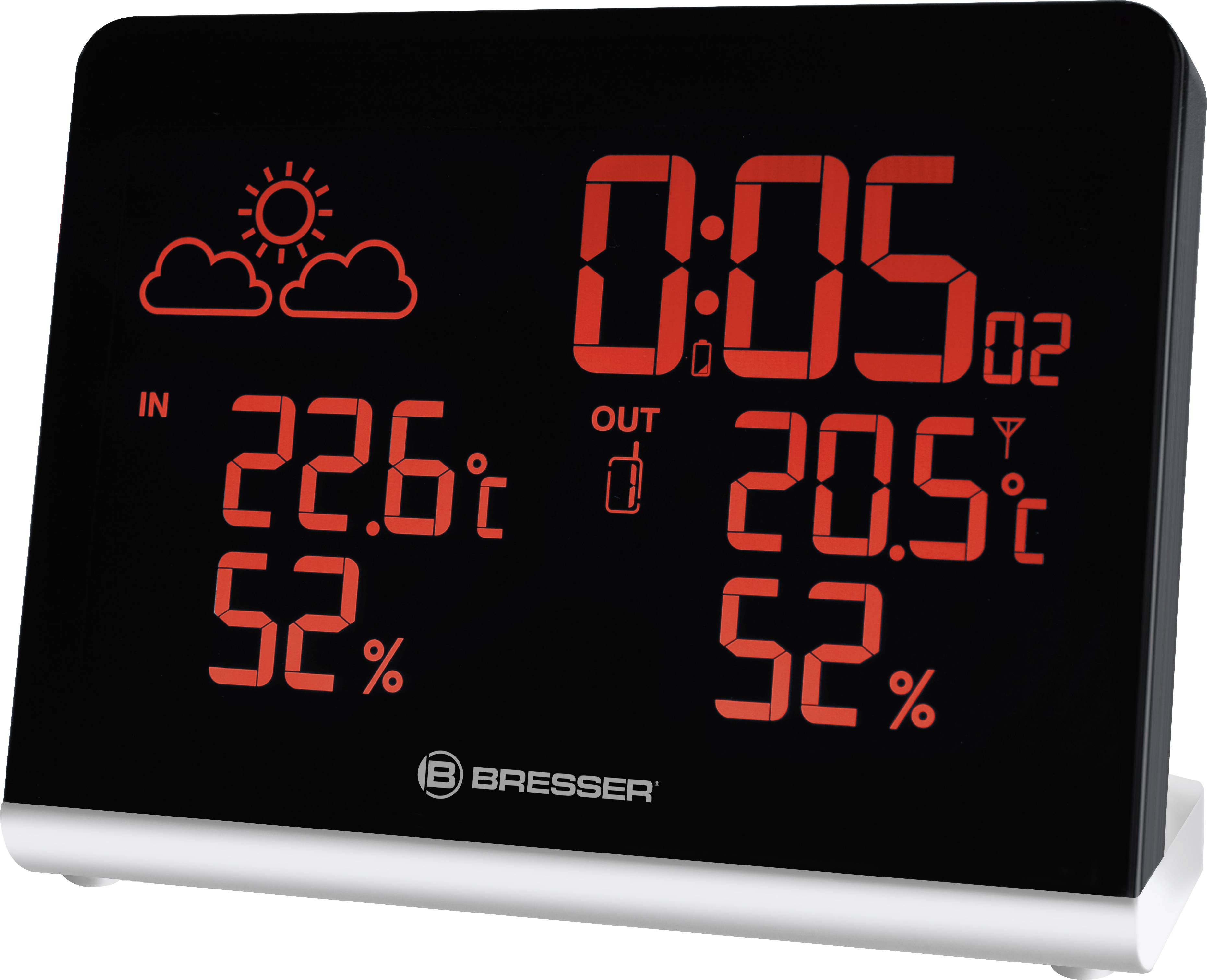 Station météorologique numérique avec affichage LED rouge montrant la température intérieure et extérieure ainsi que l'humidité. En haut, un symbole indiquant un temps allant de ensoleillé à nuageux.