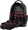 Un sac à dos à outils noir ouvert avec plusieurs poches et boucles rouges pour l'organisation des outils.