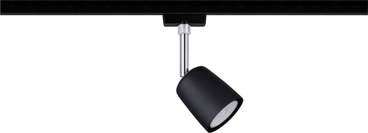 Un luminaire noir monté sur une rail métallique est orienté vers le bas et éclaire la zone située en dessous.