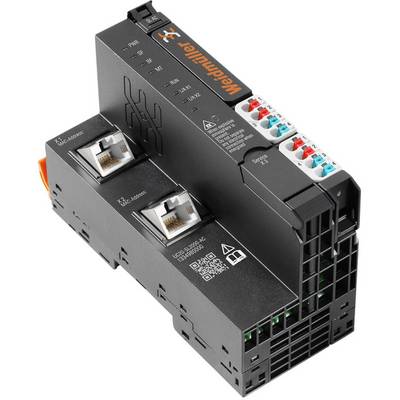 Un module électrique noir avec plusieurs ports et des marquages sur sa surface. En haut à gauche se trouvent des connexions de câbles colorées.