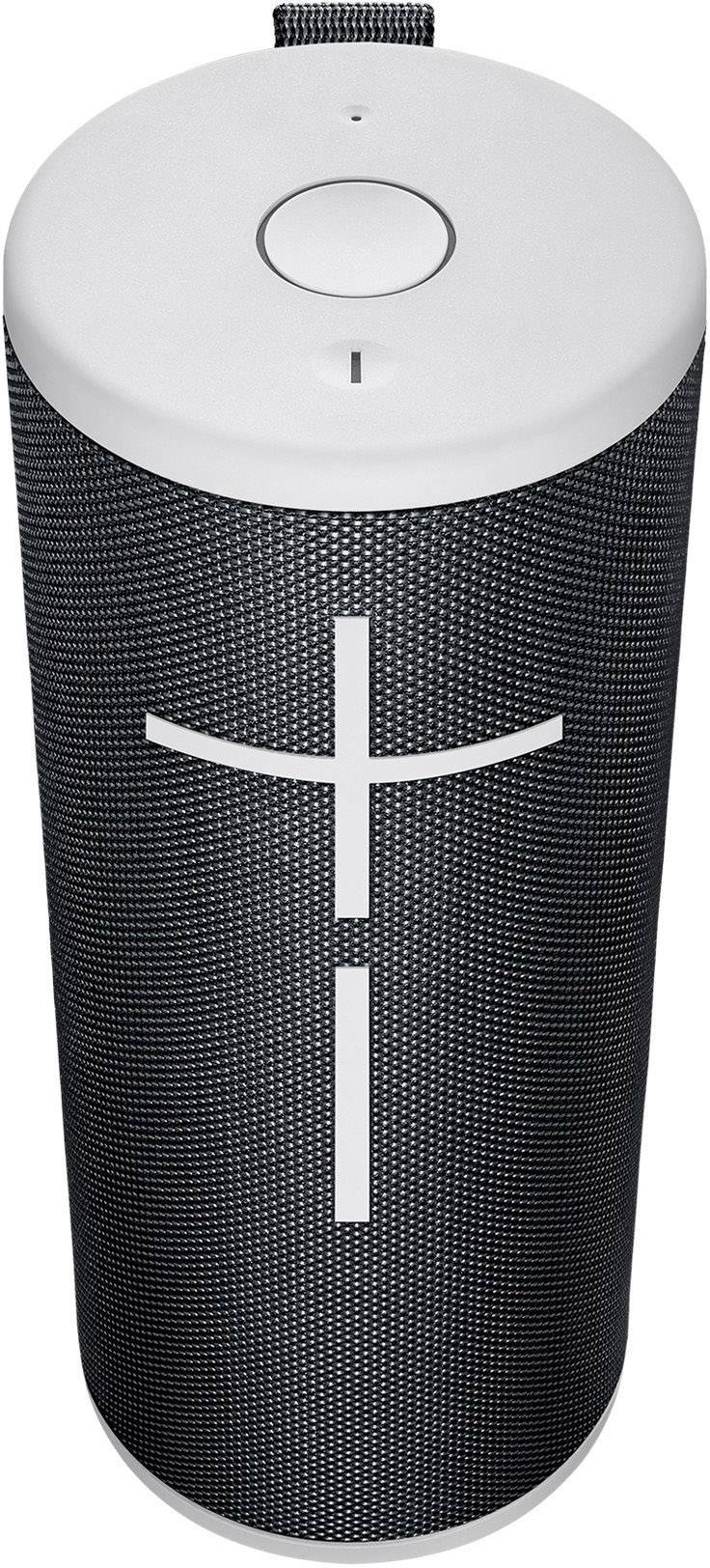 Enceinte Bluetooth portable de forme cylindrique, noire avec des touches blanches et des boutons de réglage du volume plus et moins sur l'avant.