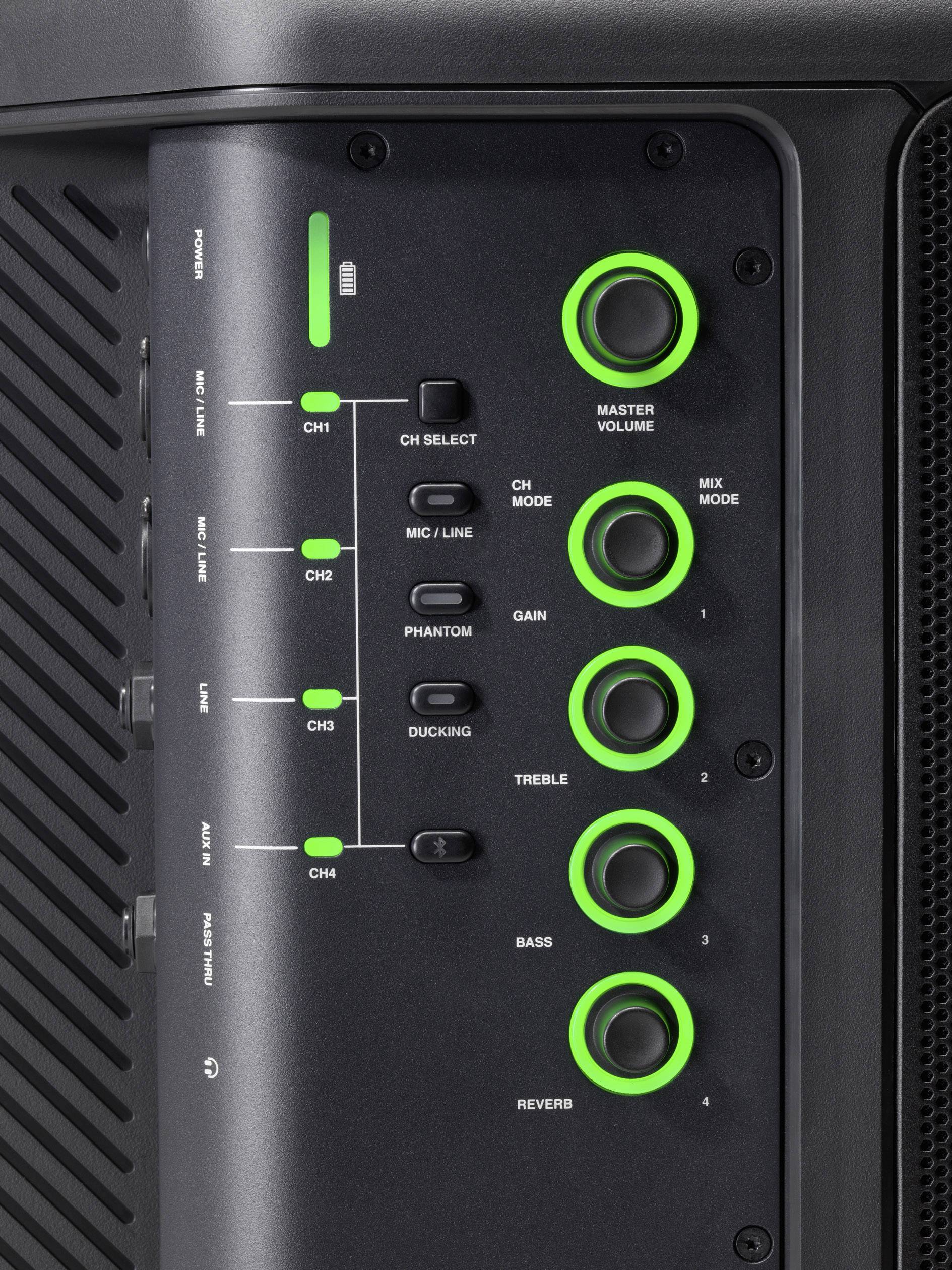 'Appareil audio noir avec des anneaux lumineux LED verts autour des boutons rotatifs, étiqueté CH1-CH4, Volume Principal, Aigus, Graves, Réverbération.'