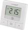 Un thermostat numérique affiche '21,5 °C'. En dessous se trouvent des touches portant les inscriptions 'Menu', 'Boost' et un signe plus.
