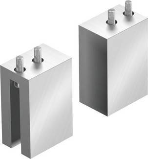 Deux blocs rectangulaires en métal, chacun doté de deux boulons cylindriques en saillie, l'un présentant une encoche en forme de U. Ils semblent être des composants techniques.
