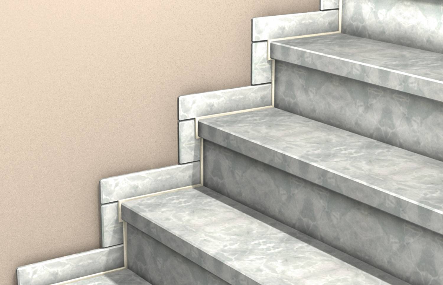 Gros plan des marches d'un escalier en pierre grise avec un mur beige, montrant le détail du bord des marches et la direction vers le haut.