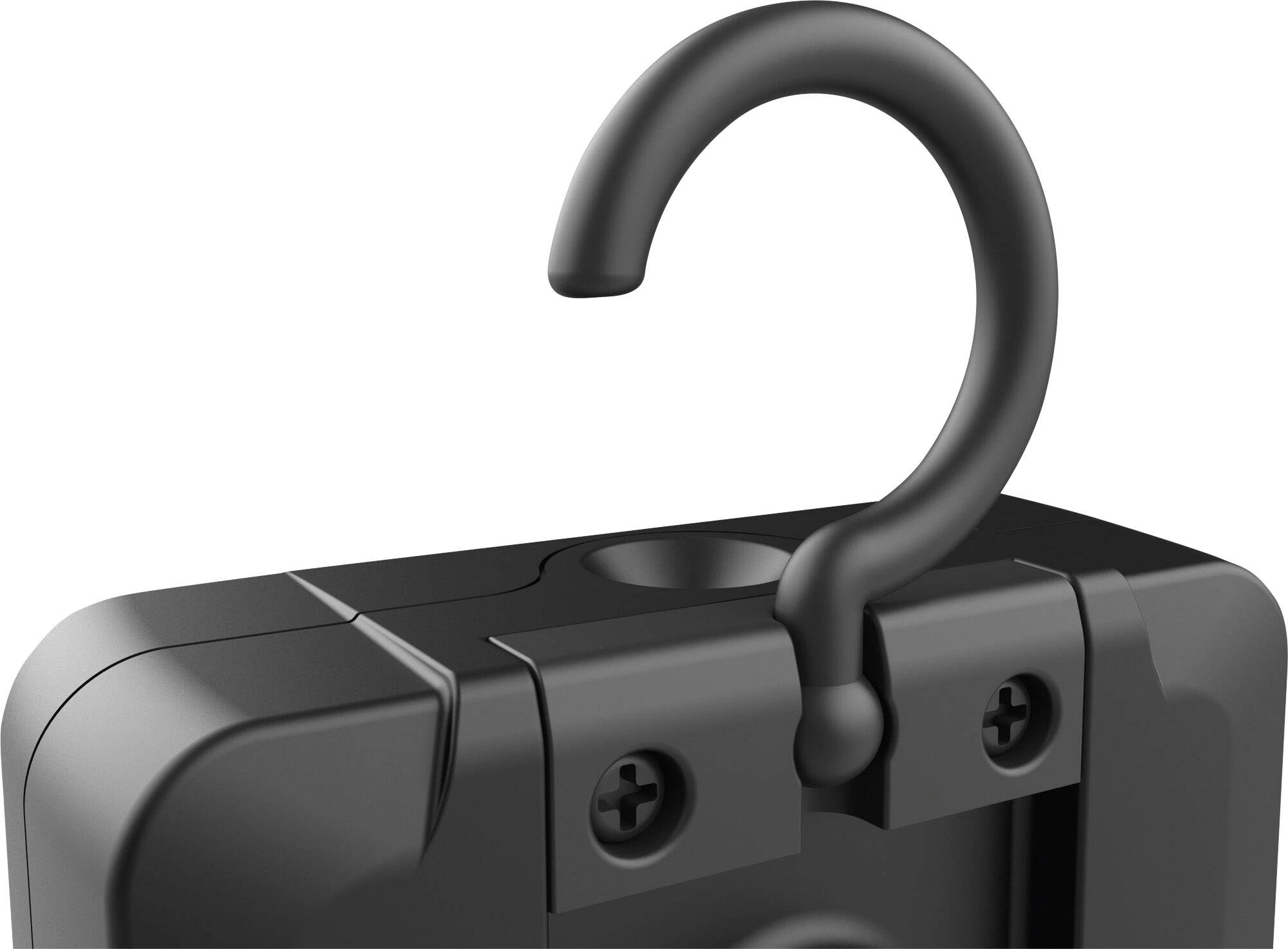 Gros plan sur un crochet en plastique noir fixé à un boîtier rectangulaire. Le boîtier présente deux vis visibles.