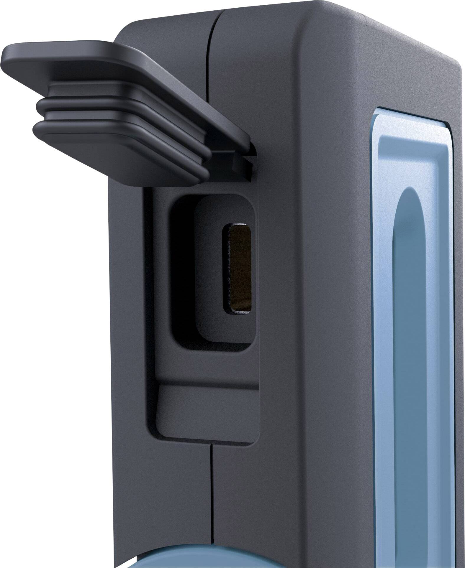 Un bouchon en plastique gris-bleu en gros plan. Un couvercle rectangulaire est soulevé, révélant une ouverture sur le côté.