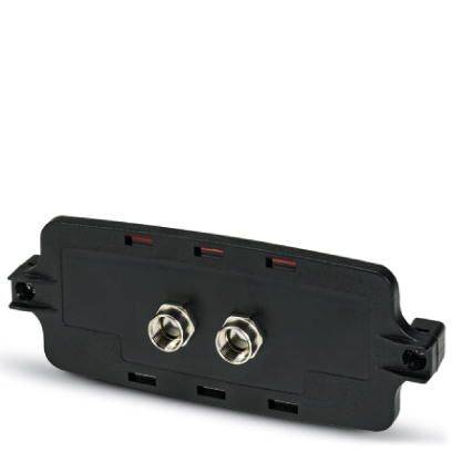 Un composant électronique noir avec deux connexions argentées au milieu, probablement utilisé à des fins de câblage.