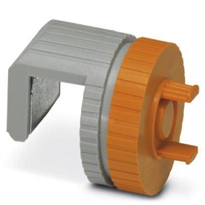 Un dispositif en plastique gris et orange avec une petite roue qui ressemble à un enrouleur de sangle mécanique. Utilisé pour les volets roulants.