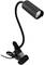 Lampe à pince LED noire avec col flexible et tête de lampe ronde ; convient pour éclairer précisément de petites zones.
