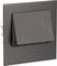 Un composant rectangulaire et plat en noir, probablement un interrupteur ou une prise de courant, avec une section inclinée en saillie.