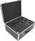 Valise noire ouverte avec un intérieur en mousse, organisée pour ranger plusieurs radios portatives et leurs accessoires.
