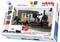 Pack de démarrage avec train miniature, rails et accessoires ; Slogan 'Découvrir la technique' ; comprend une télécommande et un camion porte-conteneurs.