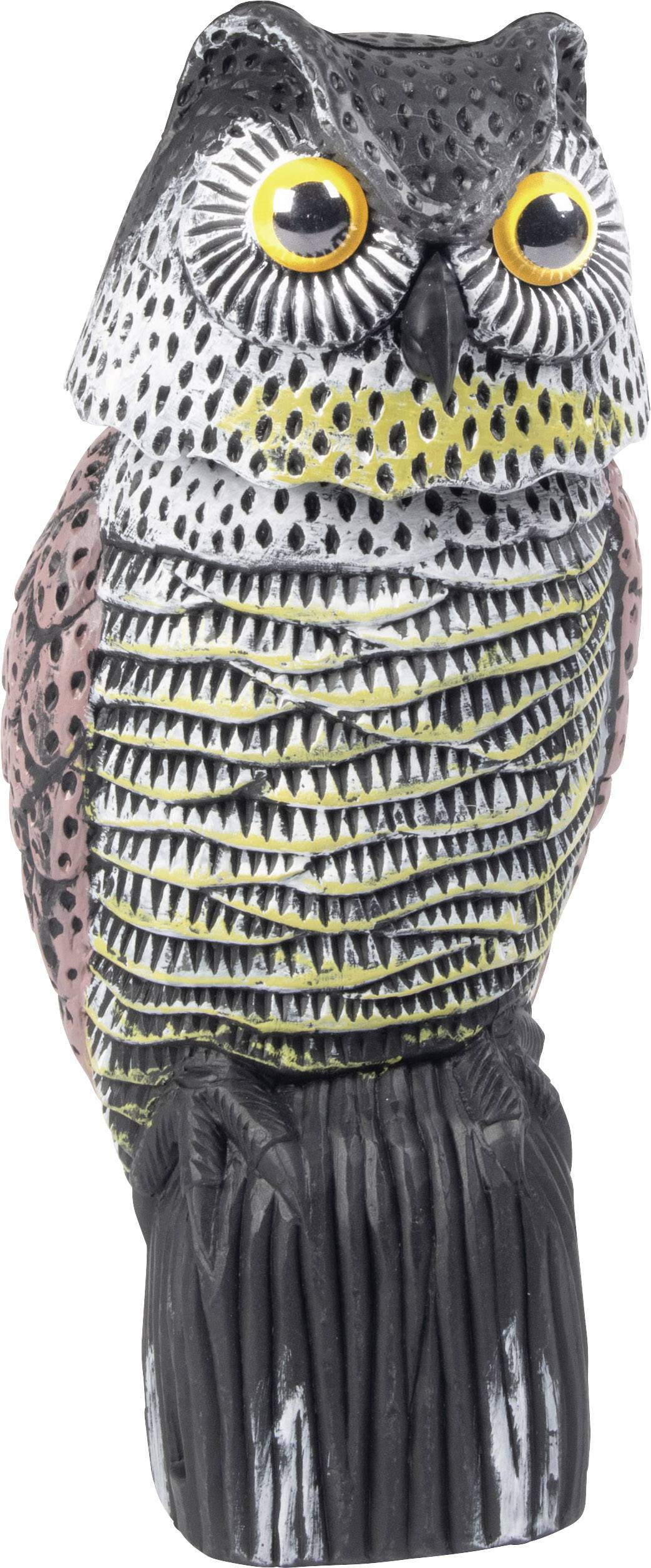 Une chouette décorative en céramique est assise bien droite. Elle présente des nuances gris, blanc, jaune et rose, avec des yeux d'un jaune éclatant.