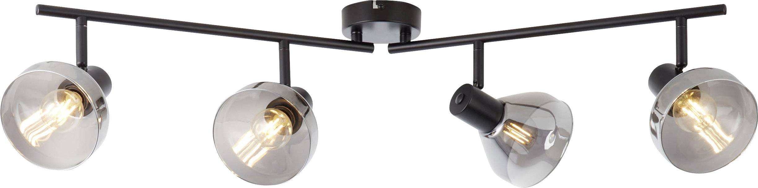 Quatre projecteurs de plafond contemporains avec des supports métalliques, montés les uns à côté des autres, émettent une lumière chaude et jaunâtre.