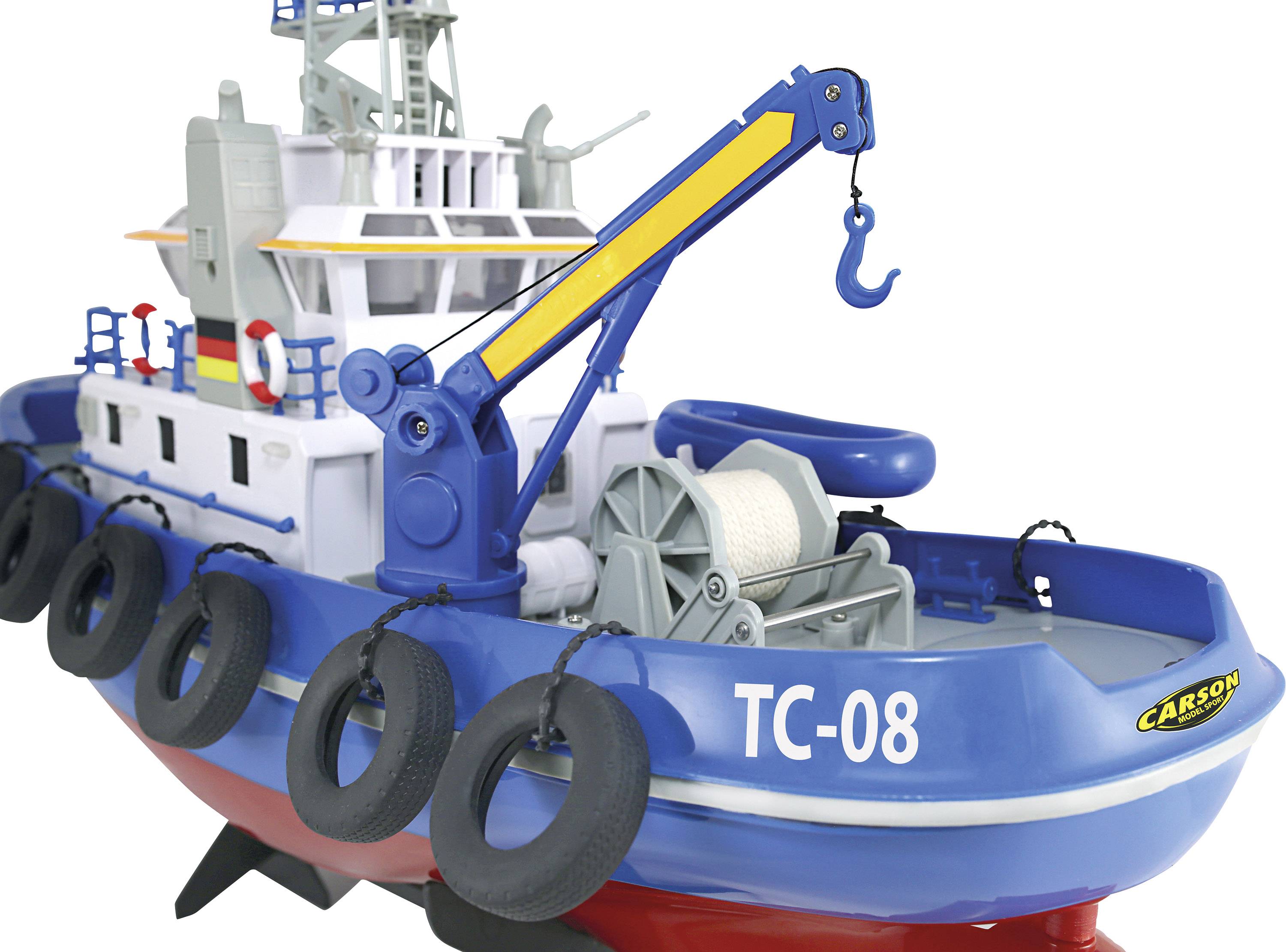 Un modèle de bateau bleu avec superstructures, bouées de sauvetage et crochets de grue. Inscription 'TC-08'.