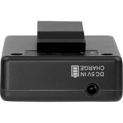 Un chargeur noir DC9V avec une prise sur le côté gauche et un indicateur de niveau de charge sur l'avant.
