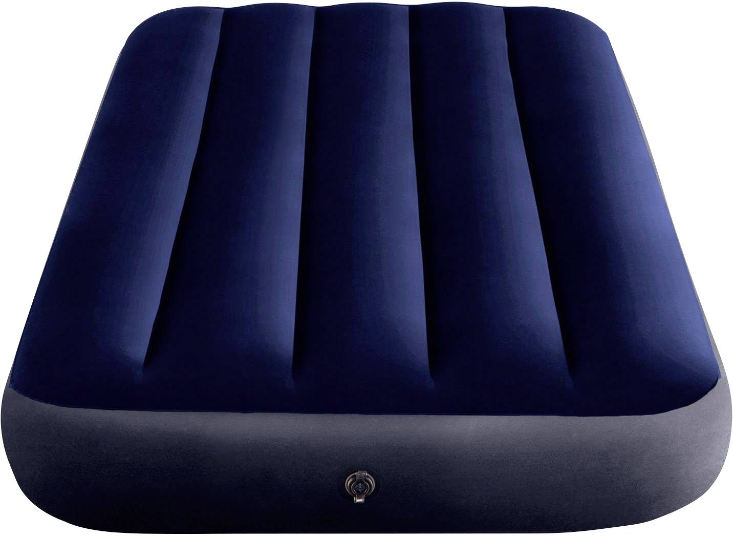 Un matelas pneumatique bleu avec une valve sur le côté, adapté pour le camping ou l'hébergement des invités.