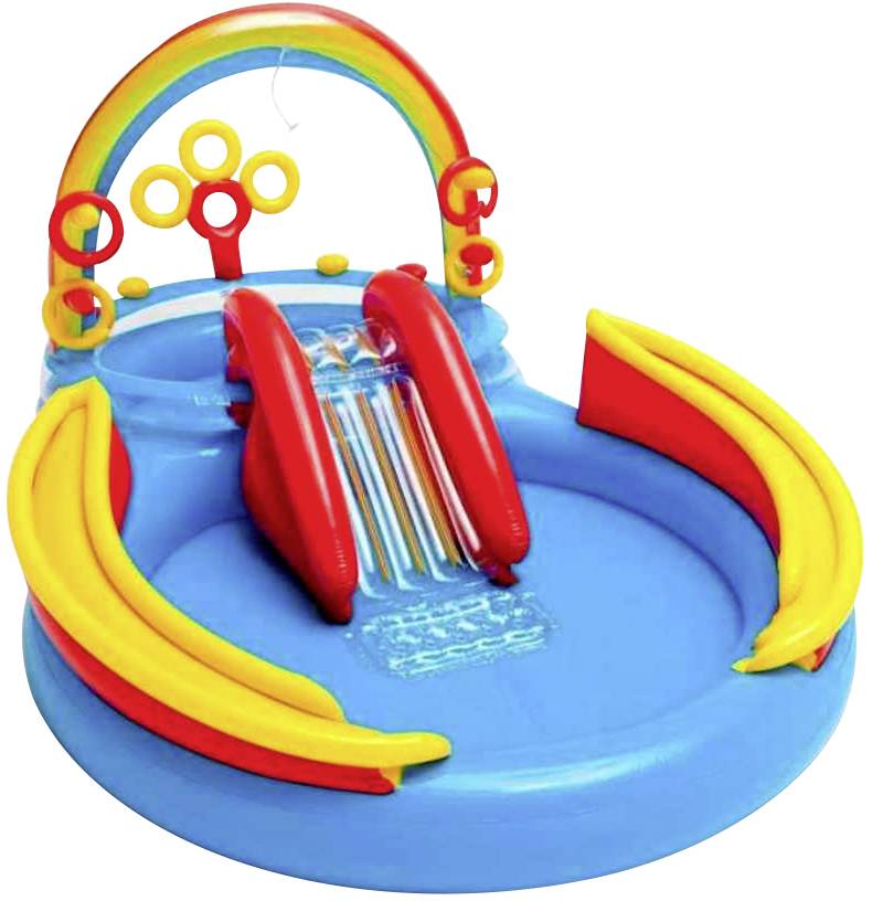 Piscine gonflable pour enfants avec toboggan, arc-en-ciel coloré, anneaux jaunes et jeux d'eau pour activités estivales.