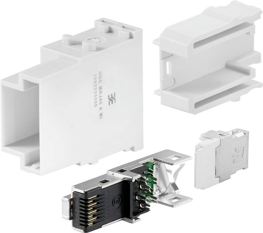 Plusieurs composants d'un élément modulaire, comprenant des parties de boîtier et un connecteur avec des circuits visibles.