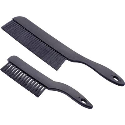 Deux peignes noirs de coiffure, l'un grand et l'autre plus petit, sont posés côte à côte sur une surface blanche.