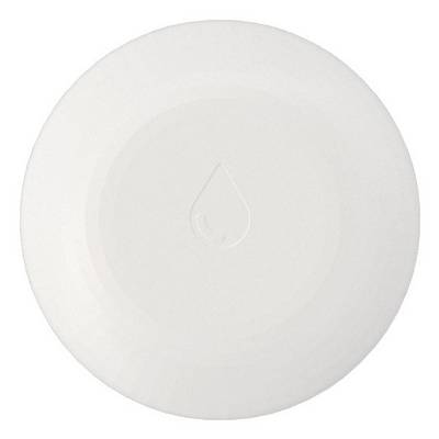 Assiette blanche ronde au design élégant et minimaliste.