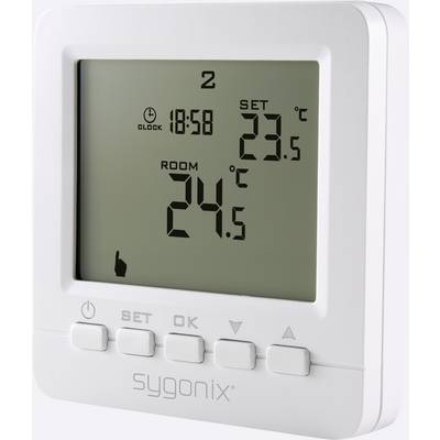 Un thermostat numérique affiche l'heure 18:58. La température programmée est de 23,5°C, tandis que la température ambiante actuelle est de 24,5°C.
