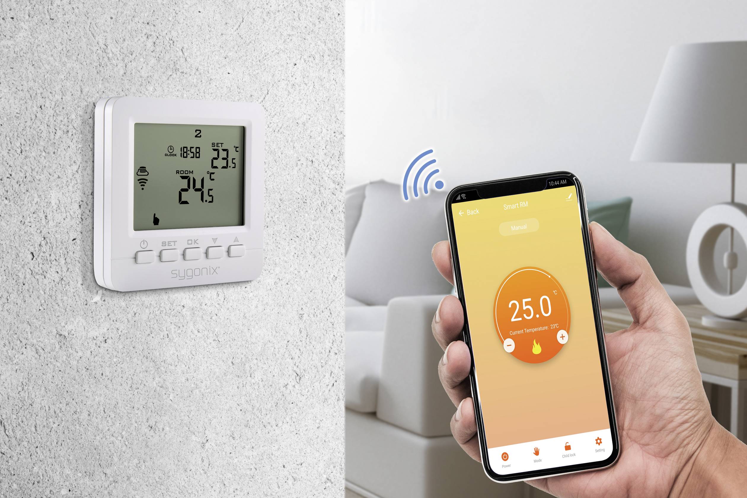 Une application smartphone contrôle le thermostat mural, qui affiche 25 degrés C. La pièce en arrière-plan illustre un style de vie moderne.