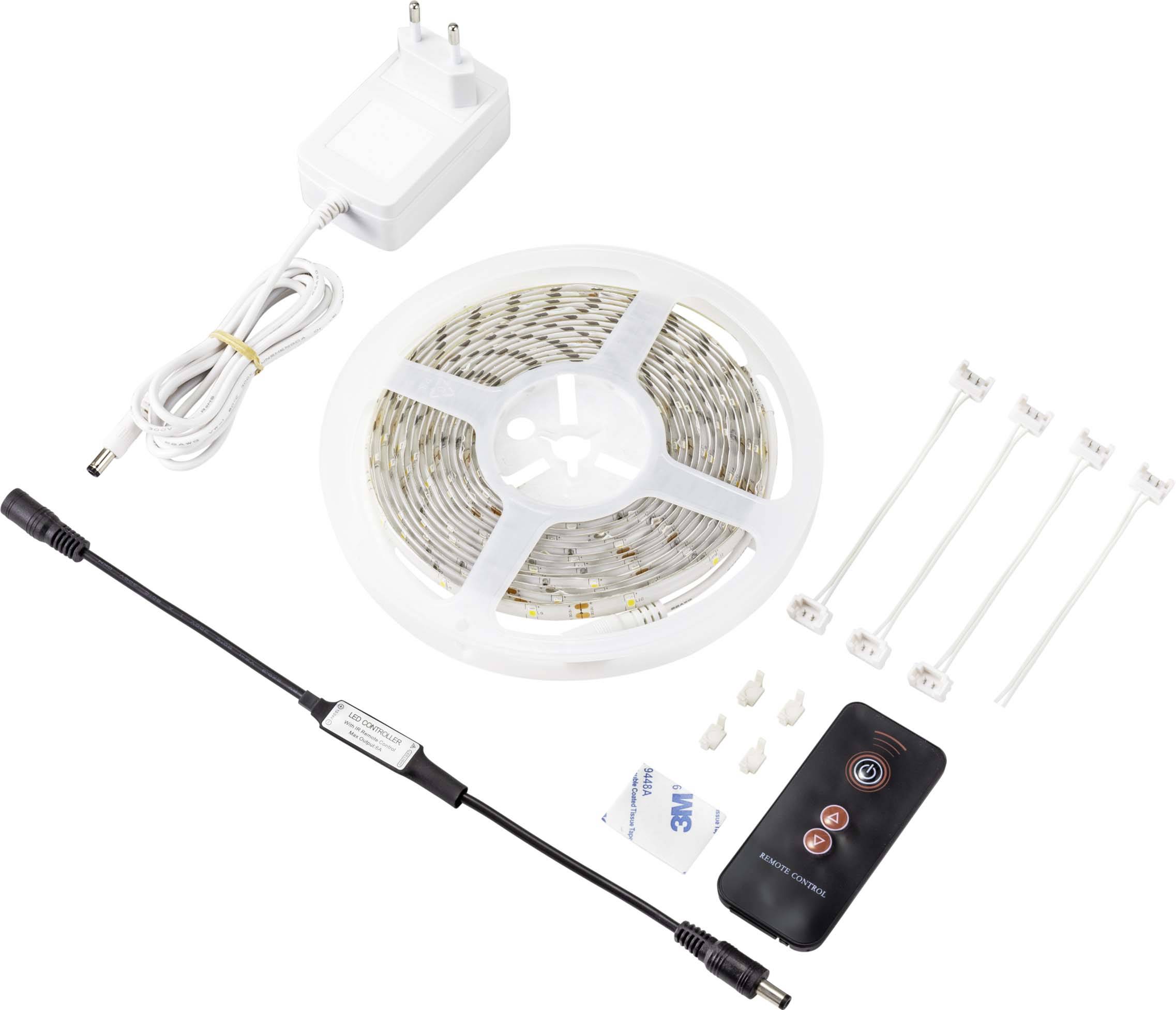 Kit de ruban LED avec alimentation, télécommande, connecteurs et supports. Idéal pour un éclairage décoratif.