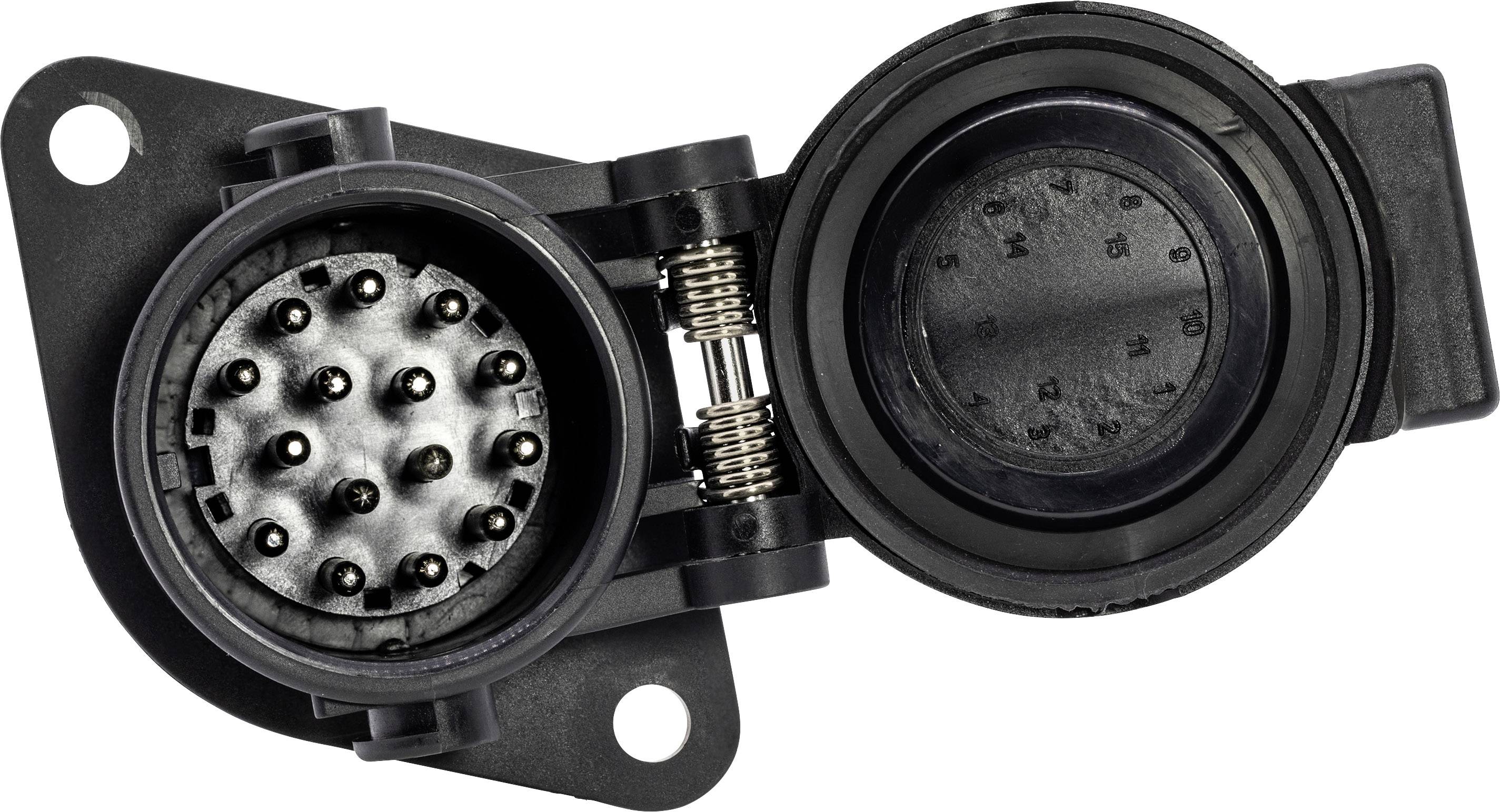 Une prise électrique noire, ronde, ouverte, présentant plusieurs broches métalliques. Utilisée pour les connexions de véhicules.