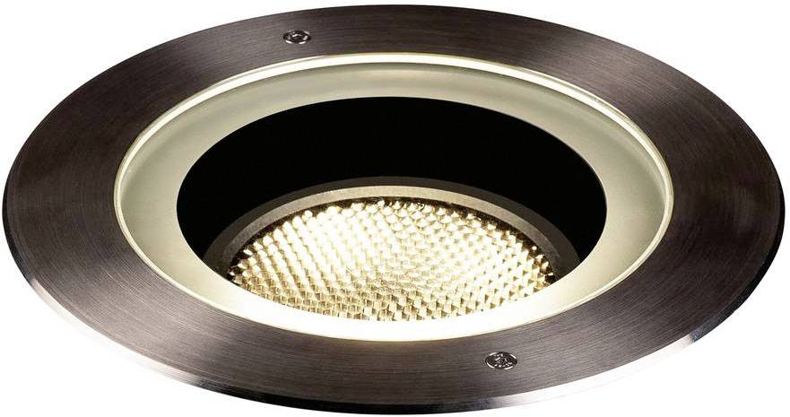 Luminaire encastré circulaire avec bordure métallique et un couvercle en verre texturé qui diffuse une lumière chaleureuse.