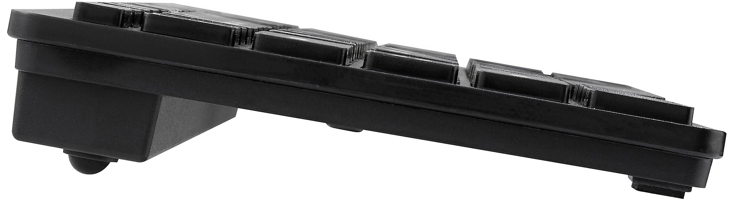Vue latérale d'un clavier d'ordinateur noir et plat, incliné vers le bas. Montre sa faible hauteur et son profil minimaliste.
