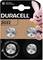 Un emballage de pile Duracell contenant quatre piles bouton (CR2032). Un lapin rose est représenté en haut à droite. Texte : « Baby Secure ».